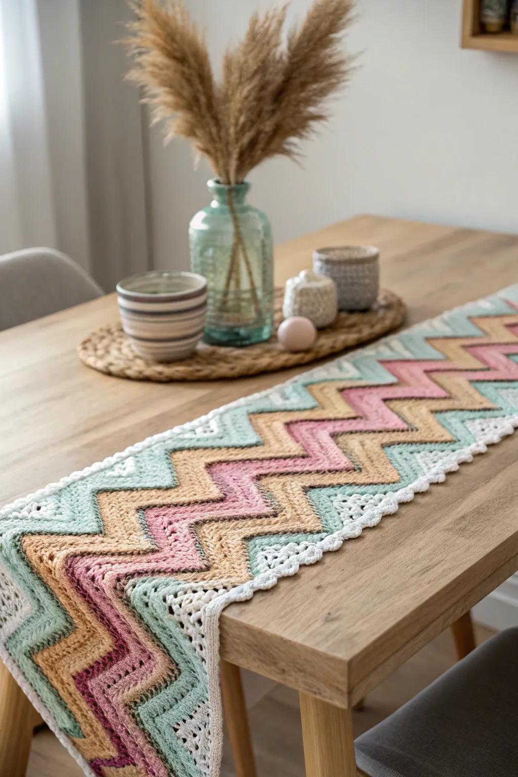 Add a vibrant touch to your dining space with a handmade zigzag table runner, blending simplicity with a splash of color. #CrochetArt #TableDecor