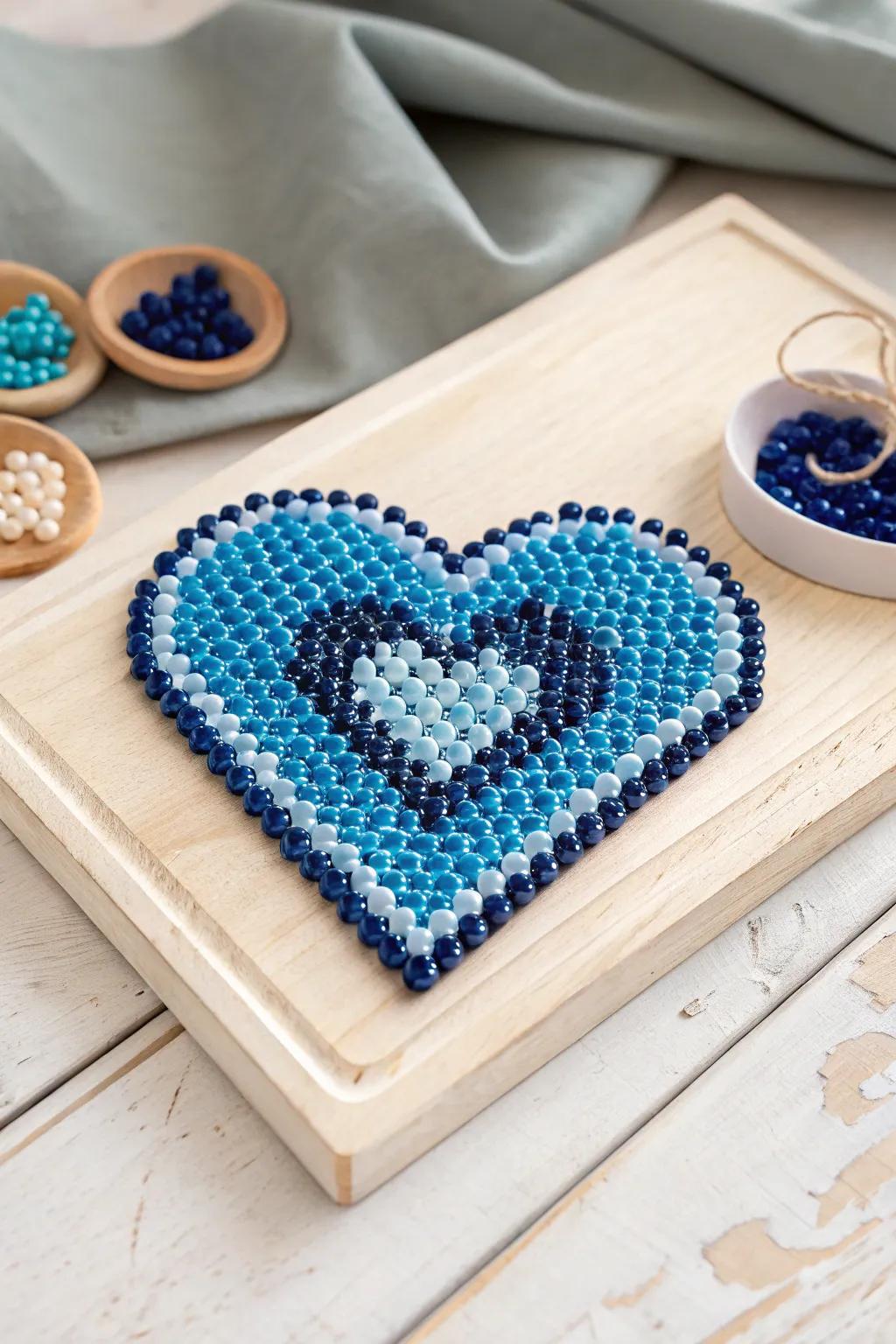 Craft love with a stunning blue heart mosaic, where simplicity meets bold elegance.