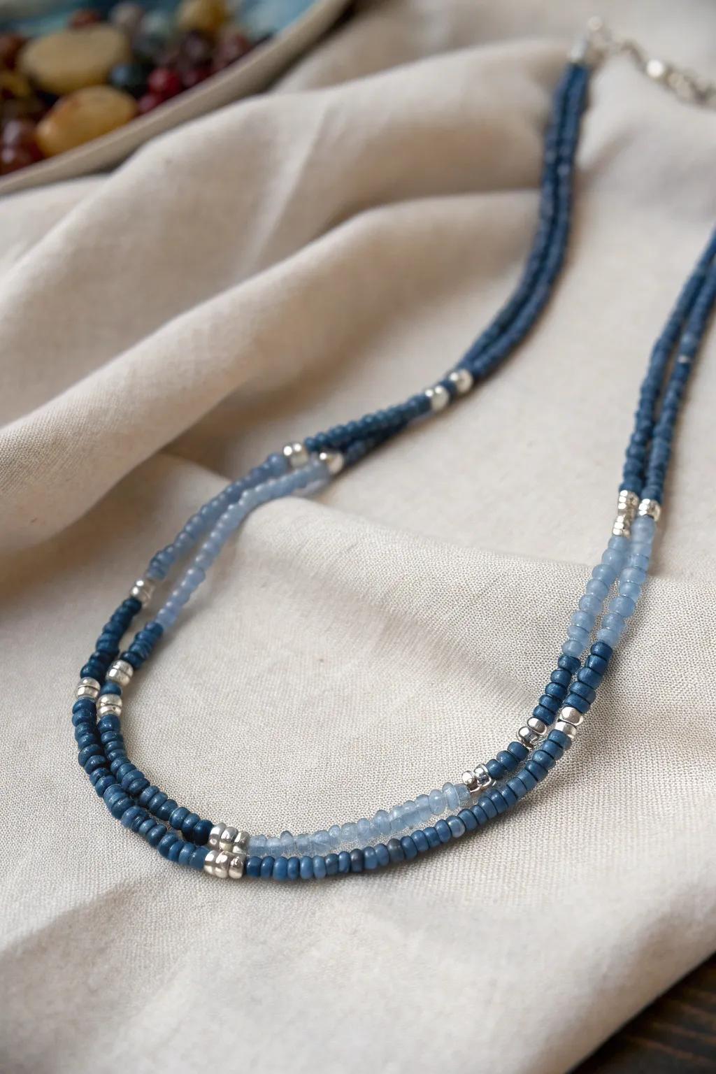 Embrace the Denim Dreams: Elevate your style with a chic blend of blue and silver seed beads.