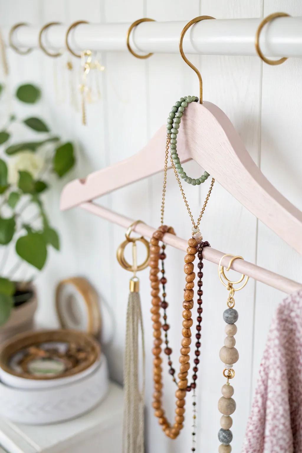 Upcycled Elegance: Transform your plastic hangers into a chic jewelry display that blends minimalist design with boho charm.